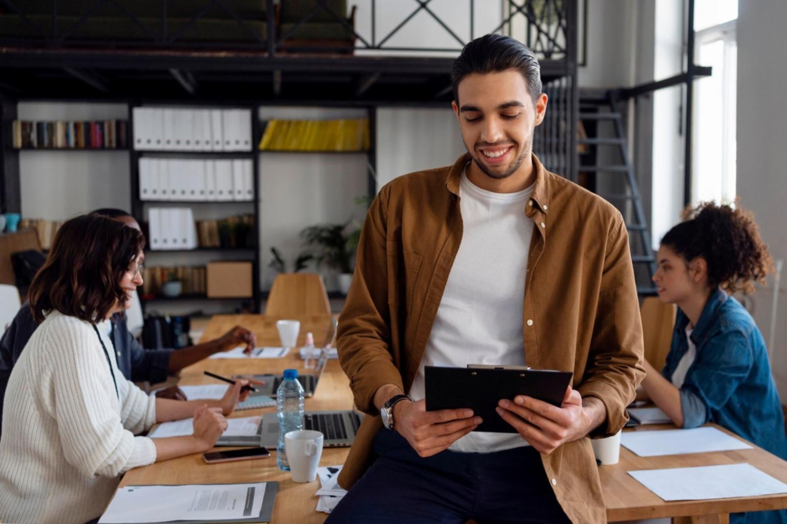 Financial planning workspace with documents and digital tools